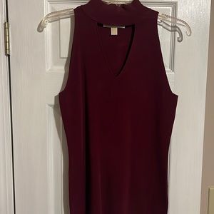 Sleeveless mock neck blouse